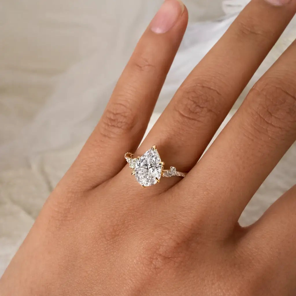 Gold Drop Engagement Ring with Cubic Zirconia in gold tone