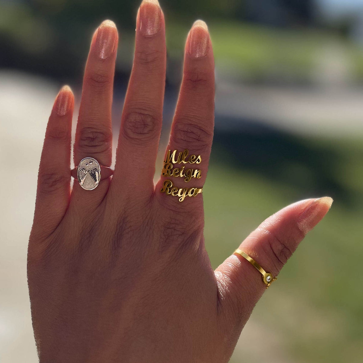 Anello con tre nomi