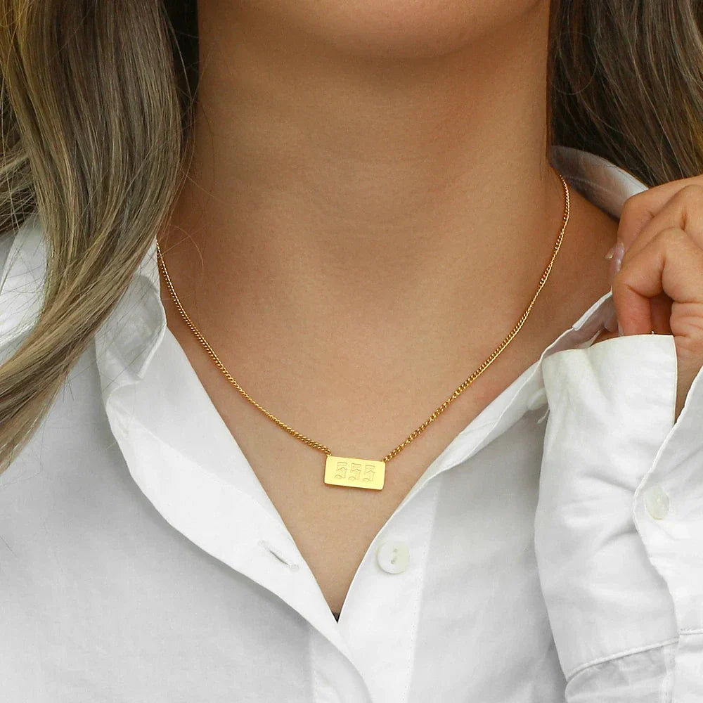 Angel Number Bar Necklace, in its gift packaging