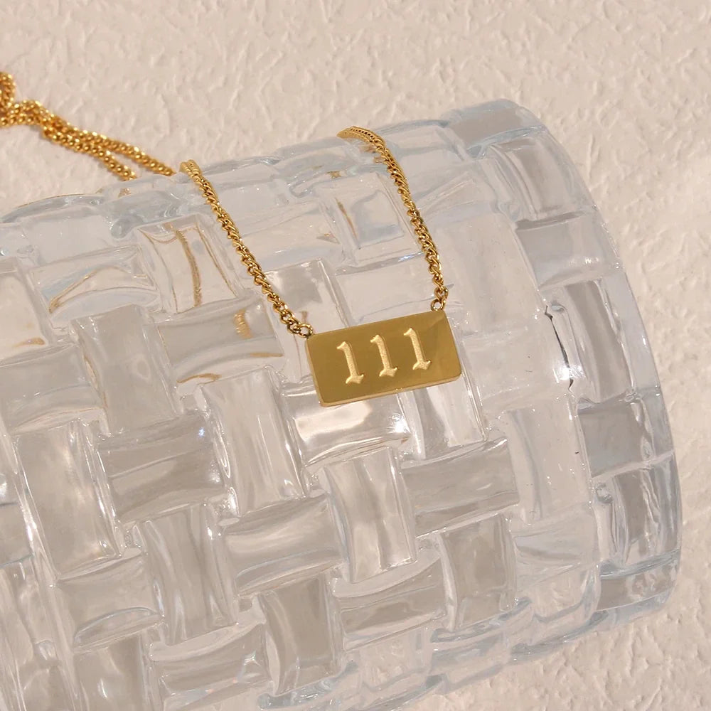 Angel Number Bar Necklace, in its gift packaging