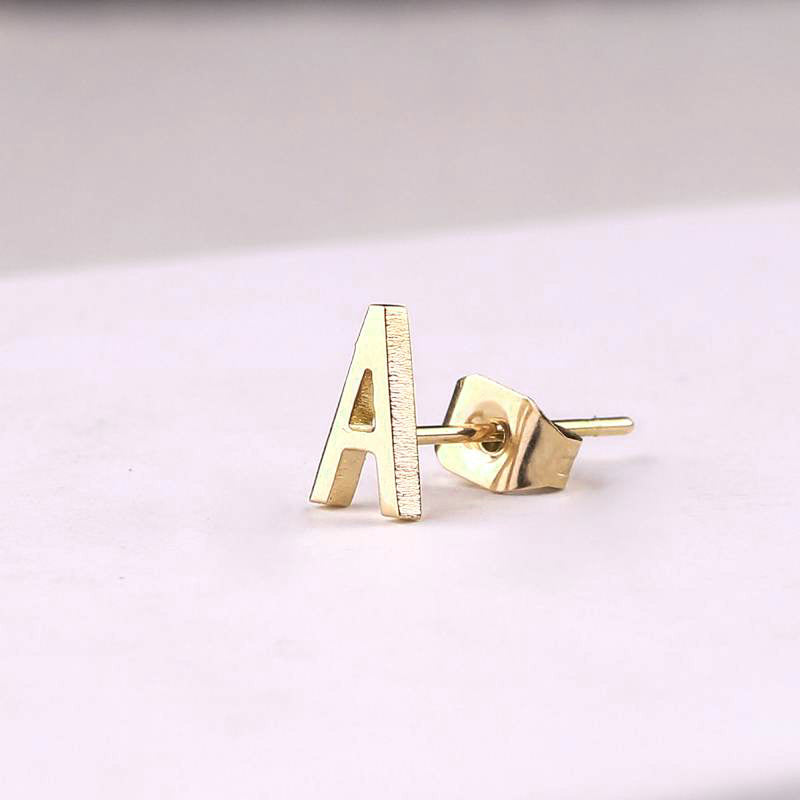 The Skinny Initial Earrings in gold tone