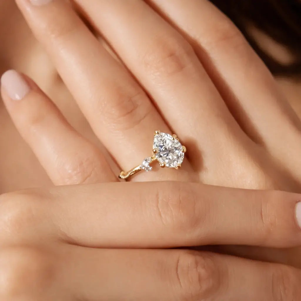 Gold Drop Engagement Ring with Cubic Zirconia in gold tone