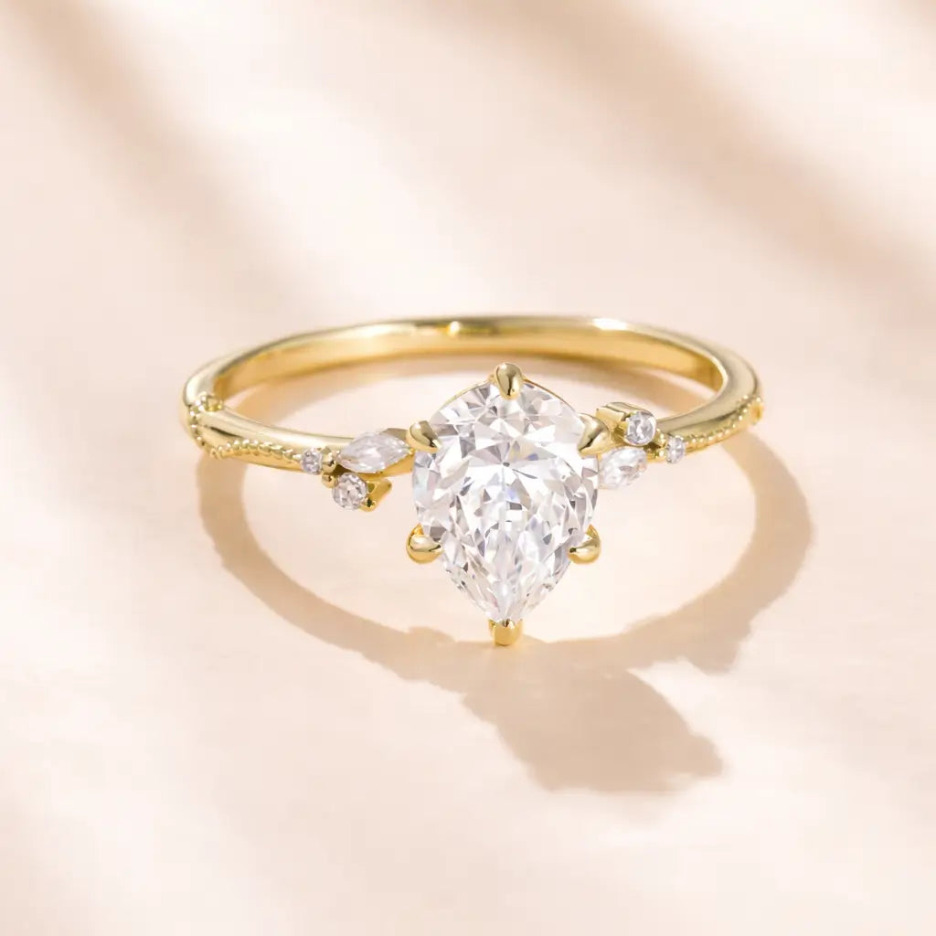 Gold Drop Engagement Ring with Cubic Zirconia in gold tone