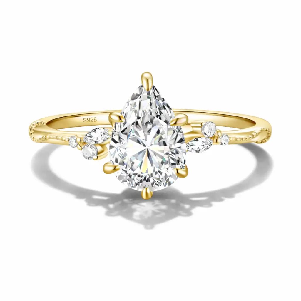 Gold Drop Engagement Ring with Cubic Zirconia in gold tone