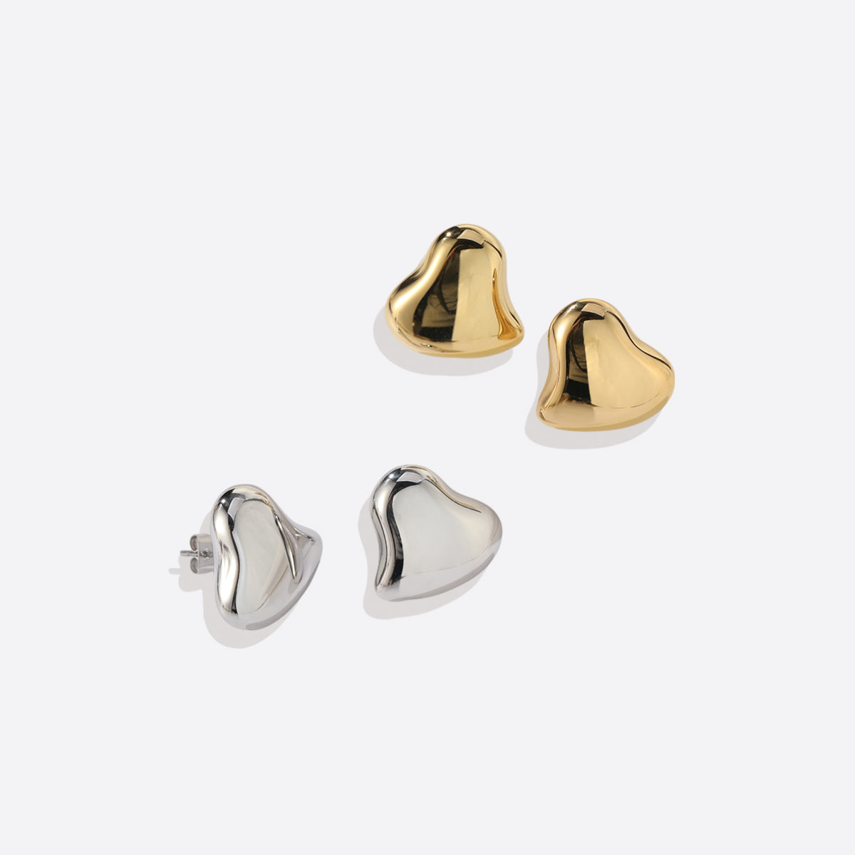 Polished Sculptural Heart Earrings in 925 sterling silver