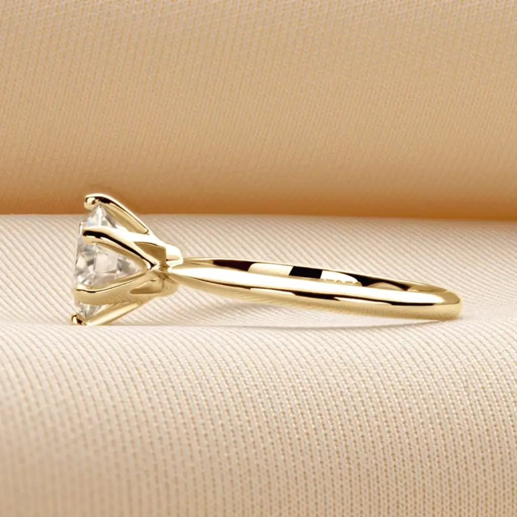 Luz 18k Gold Moissanite Engagement Ring in gold tone