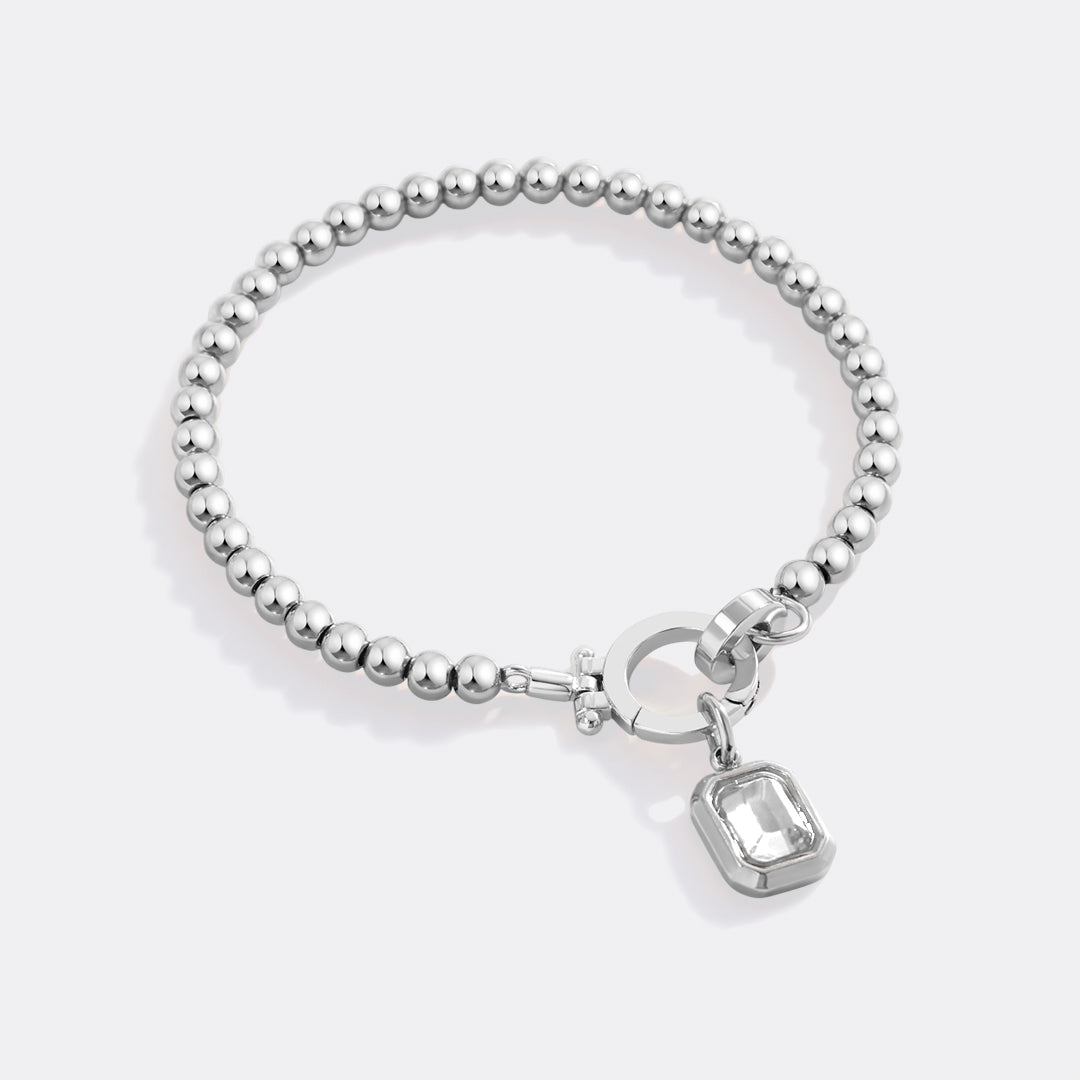 Minzfarbenes Perlenarmband mit Baguette-Geburtsstein-Anhänger