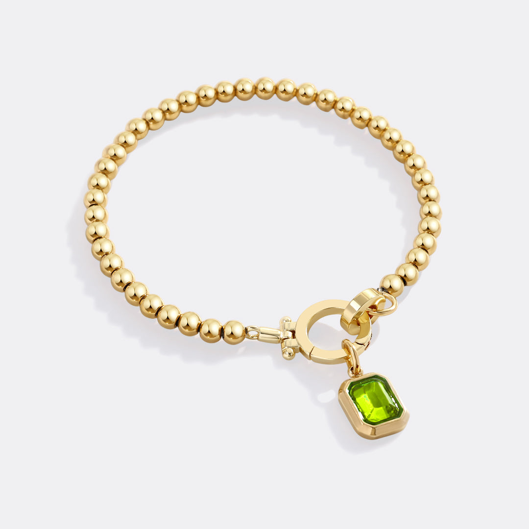 Minzfarbenes Perlenarmband mit Baguette-Geburtsstein-Anhänger