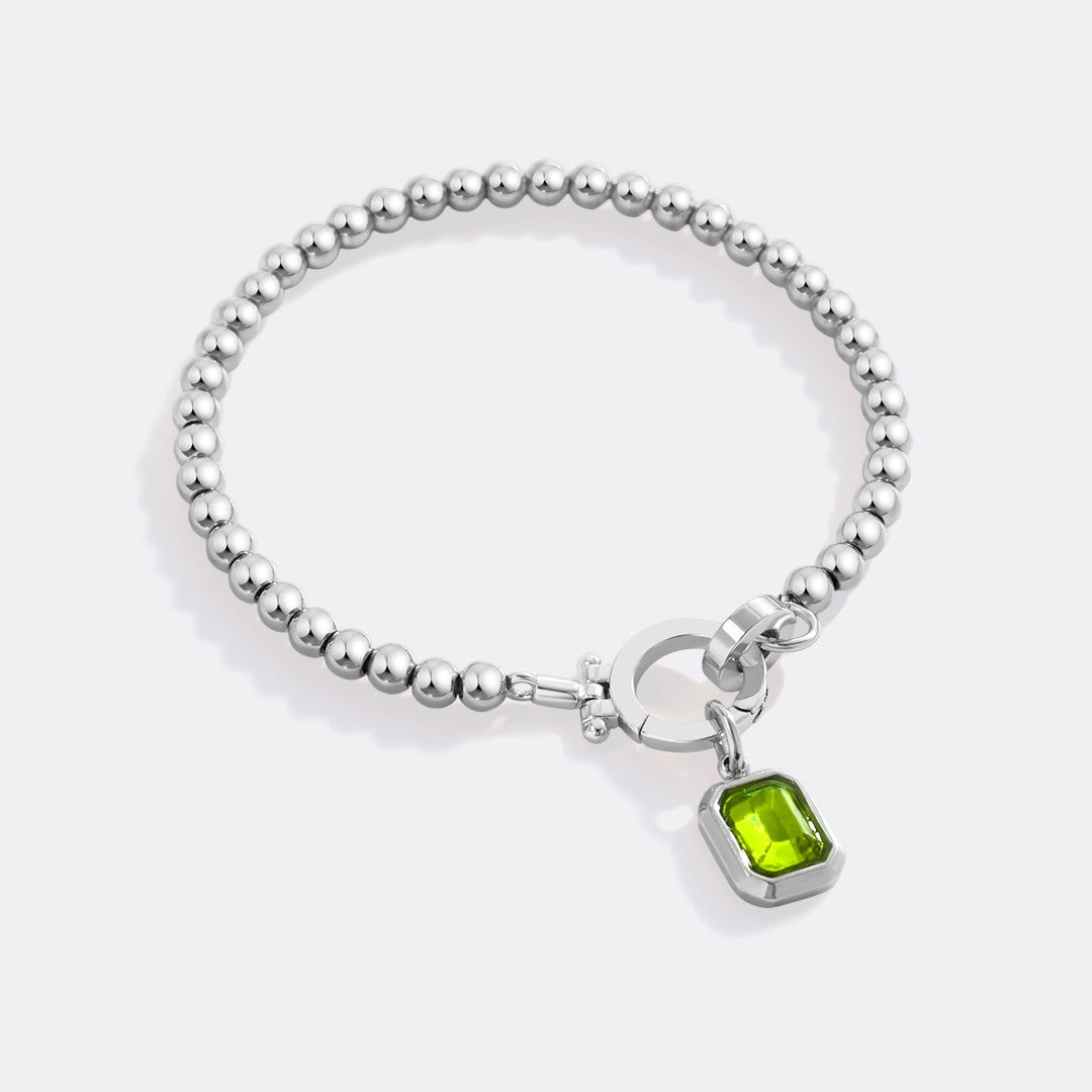 Minzfarbenes Perlenarmband mit Baguette-Geburtsstein-Anhänger