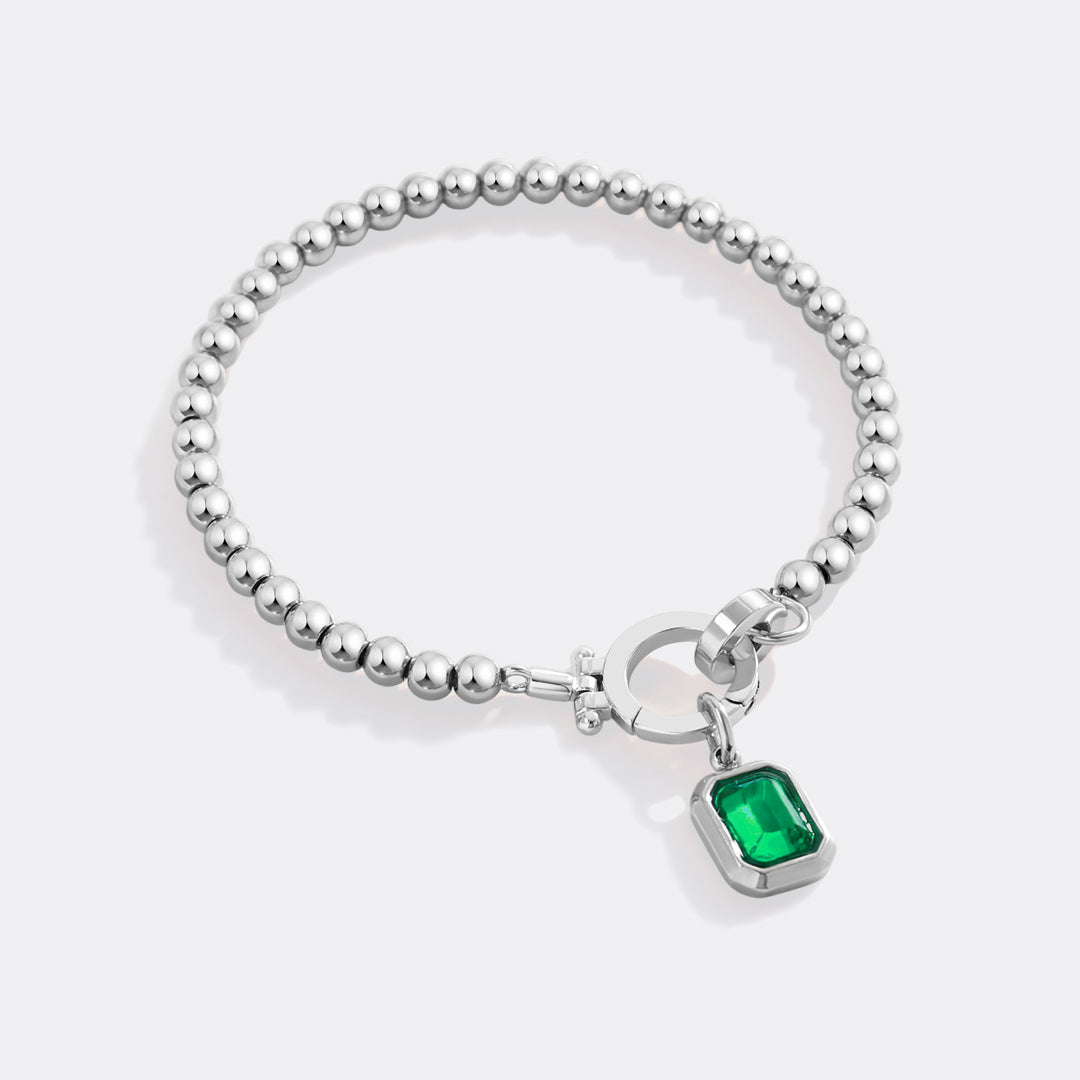 Minzfarbenes Perlenarmband mit Baguette-Geburtsstein-Anhänger