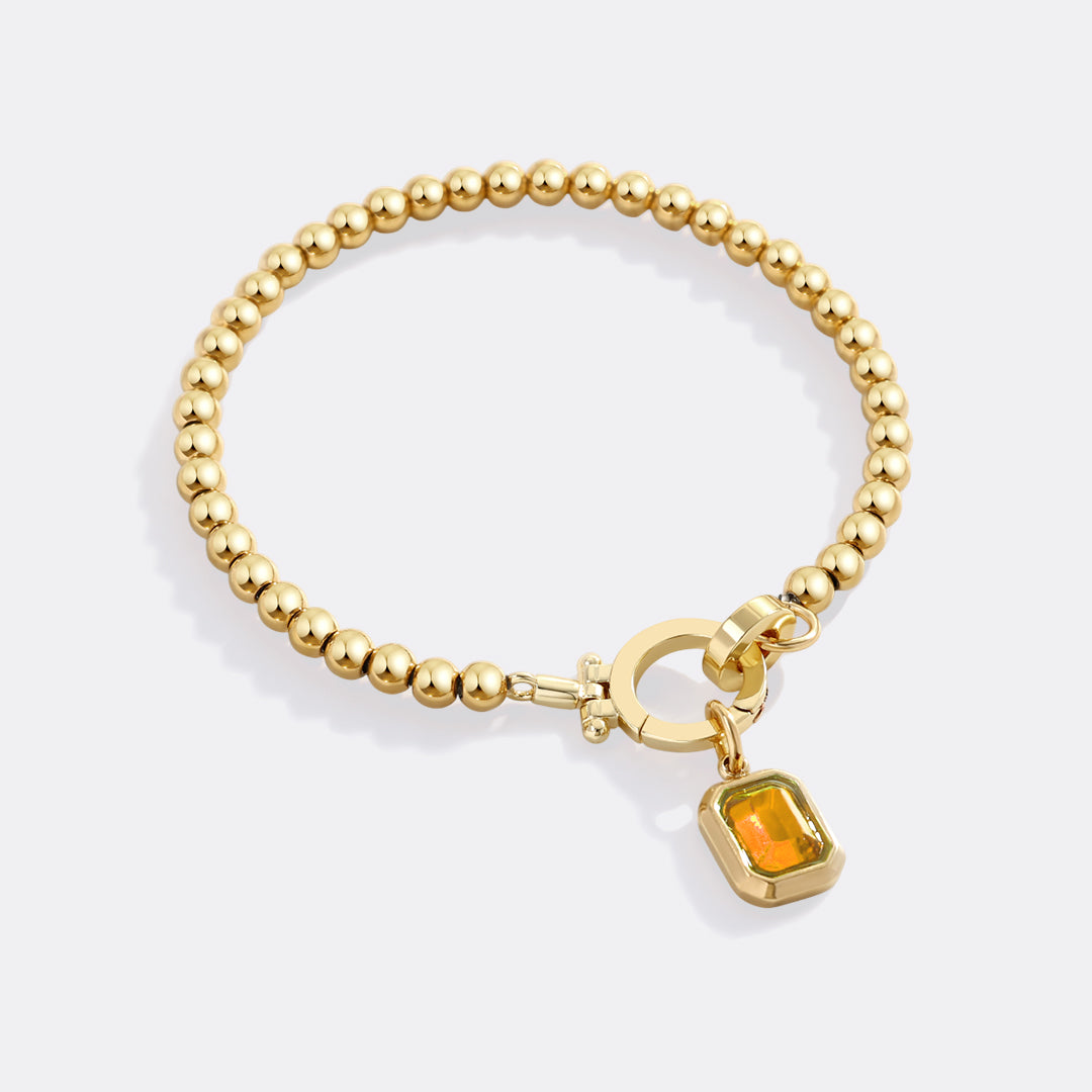 Minzfarbenes Perlenarmband mit Baguette-Geburtsstein-Anhänger