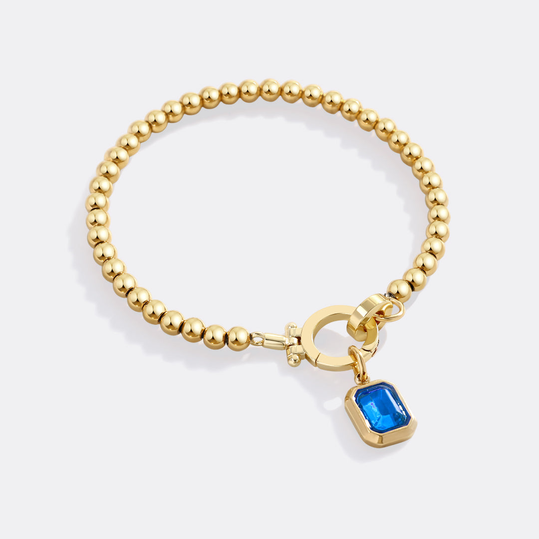Minzfarbenes Perlenarmband mit Baguette-Geburtsstein-Anhänger