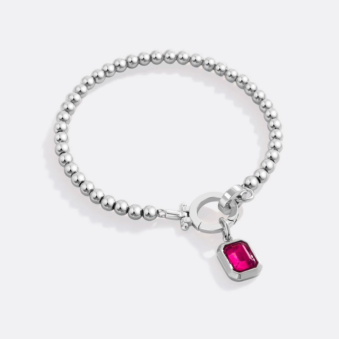 Minzfarbenes Perlenarmband mit Baguette-Geburtsstein-Anhänger
