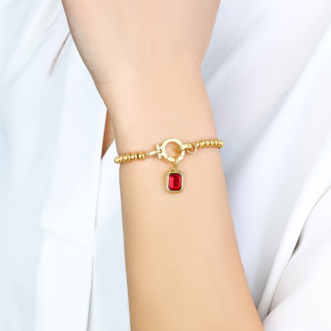 Minzfarbenes Perlenarmband mit Baguette-Geburtsstein-Anhänger