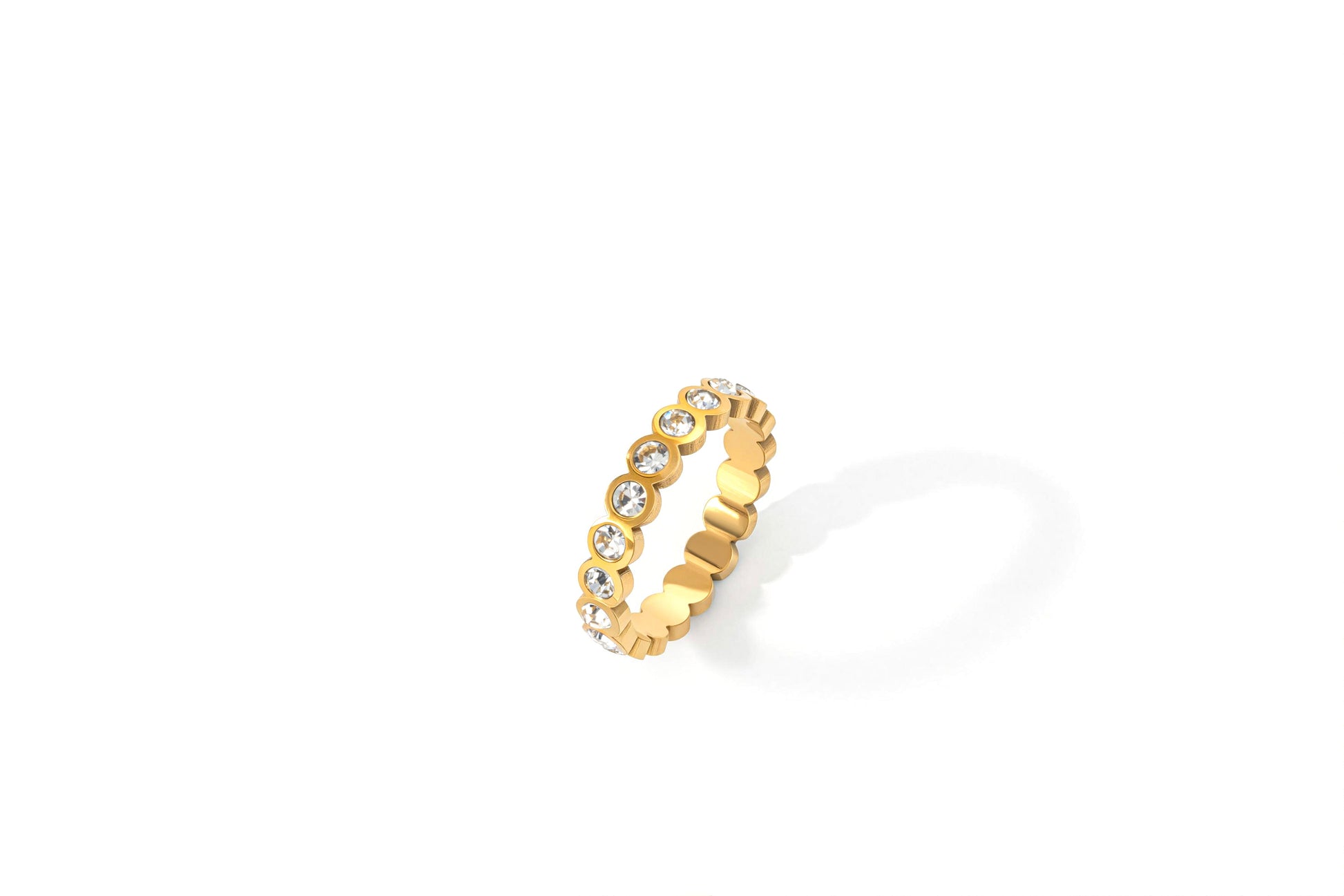 Bezel Set Eternity Stacking Ring in gold tone, flat lay detail