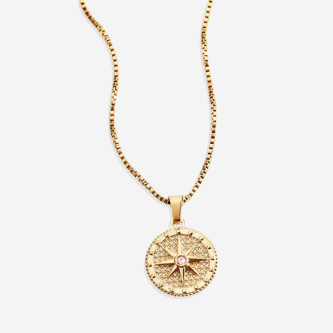 Birthstone Compass Pendant Necklace in gold tone with October birthstone