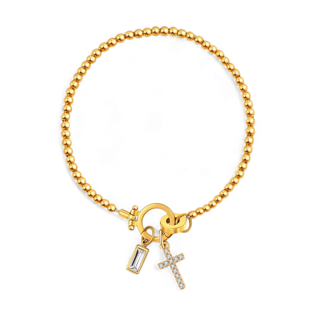 Cross Charm Birthstone Bracelet in gold tone with April birthstone