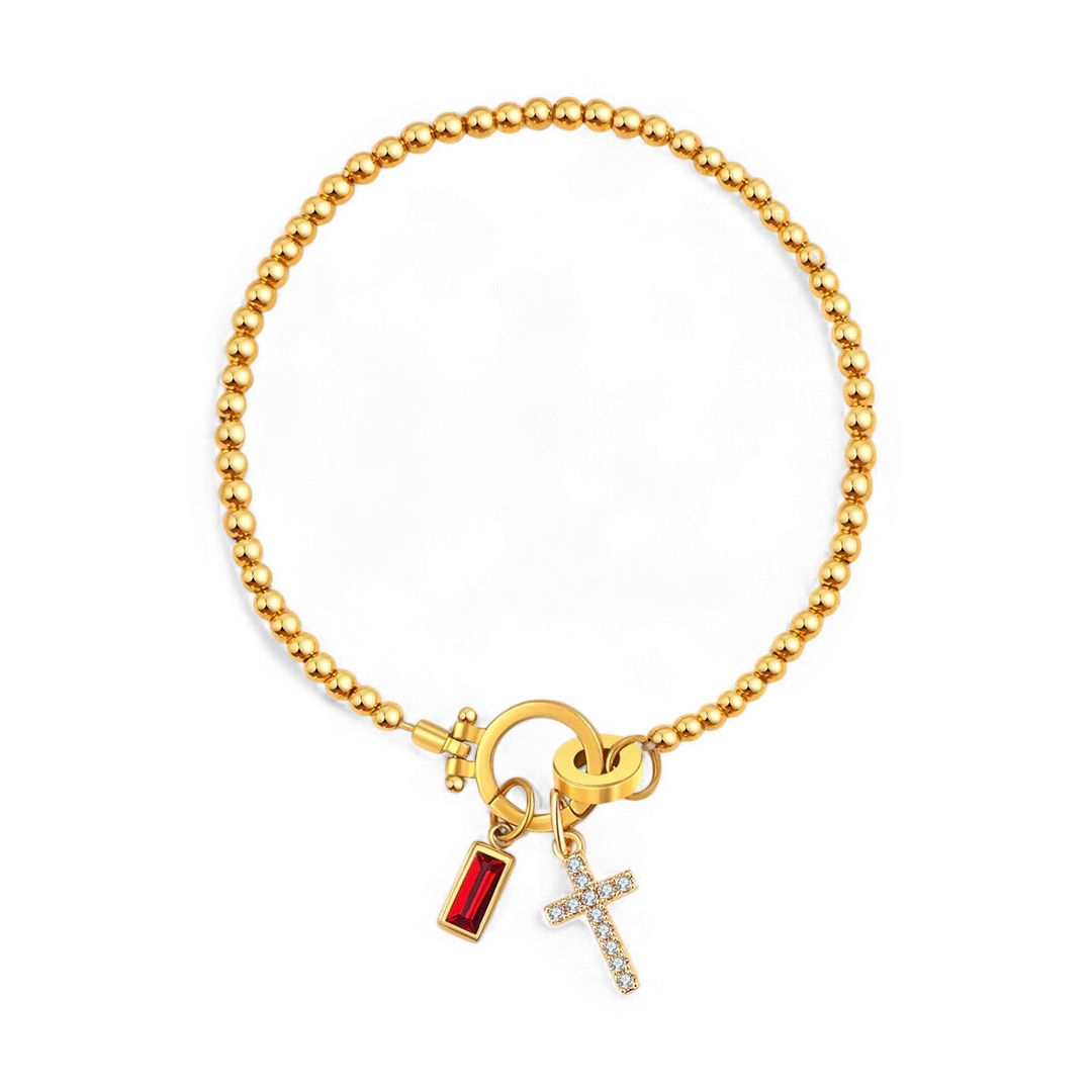 Cross Charm Birthstone Bracelet in gold tone with July birthstone
