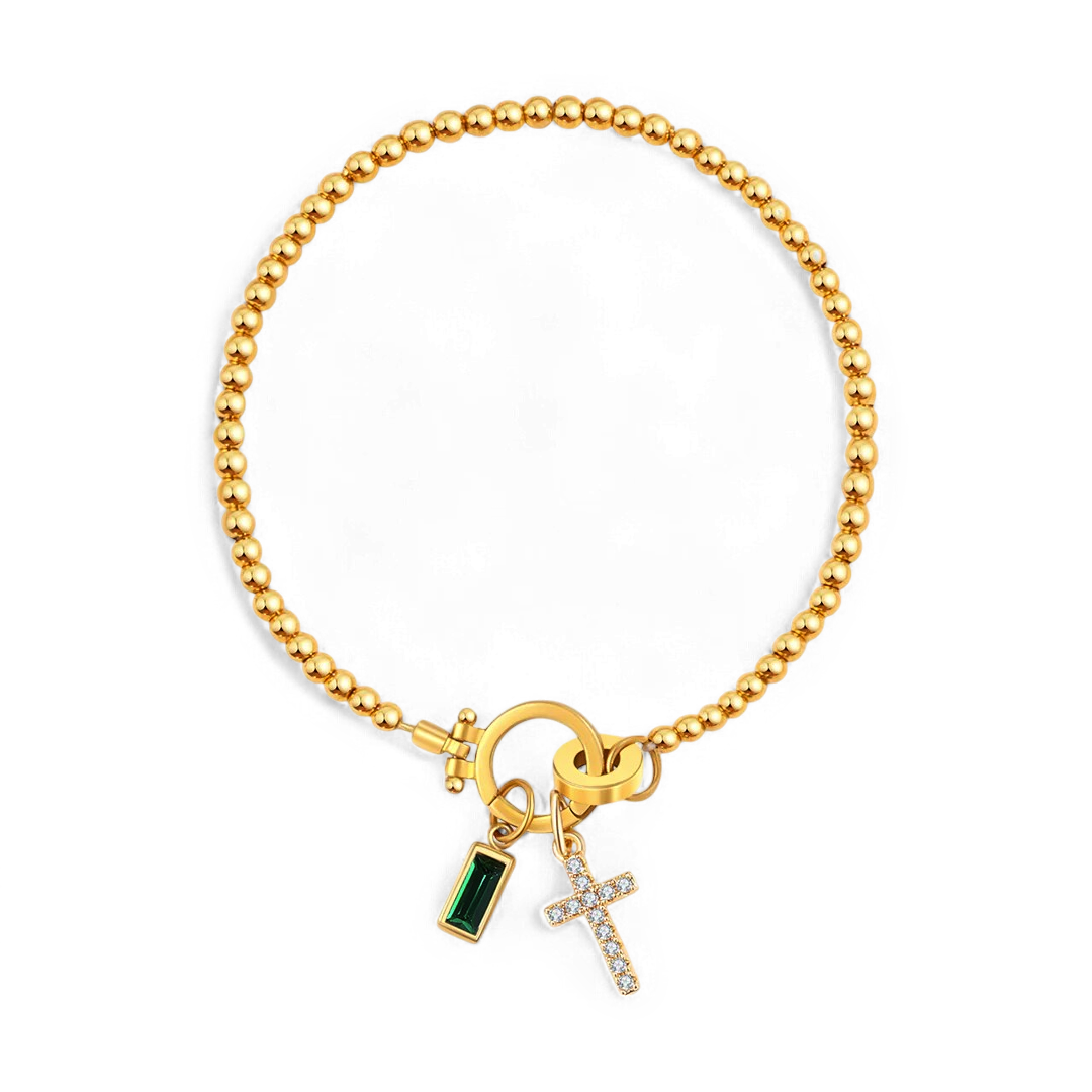 Cross Charm Birthstone Bracelet in gold tone with May birthstone