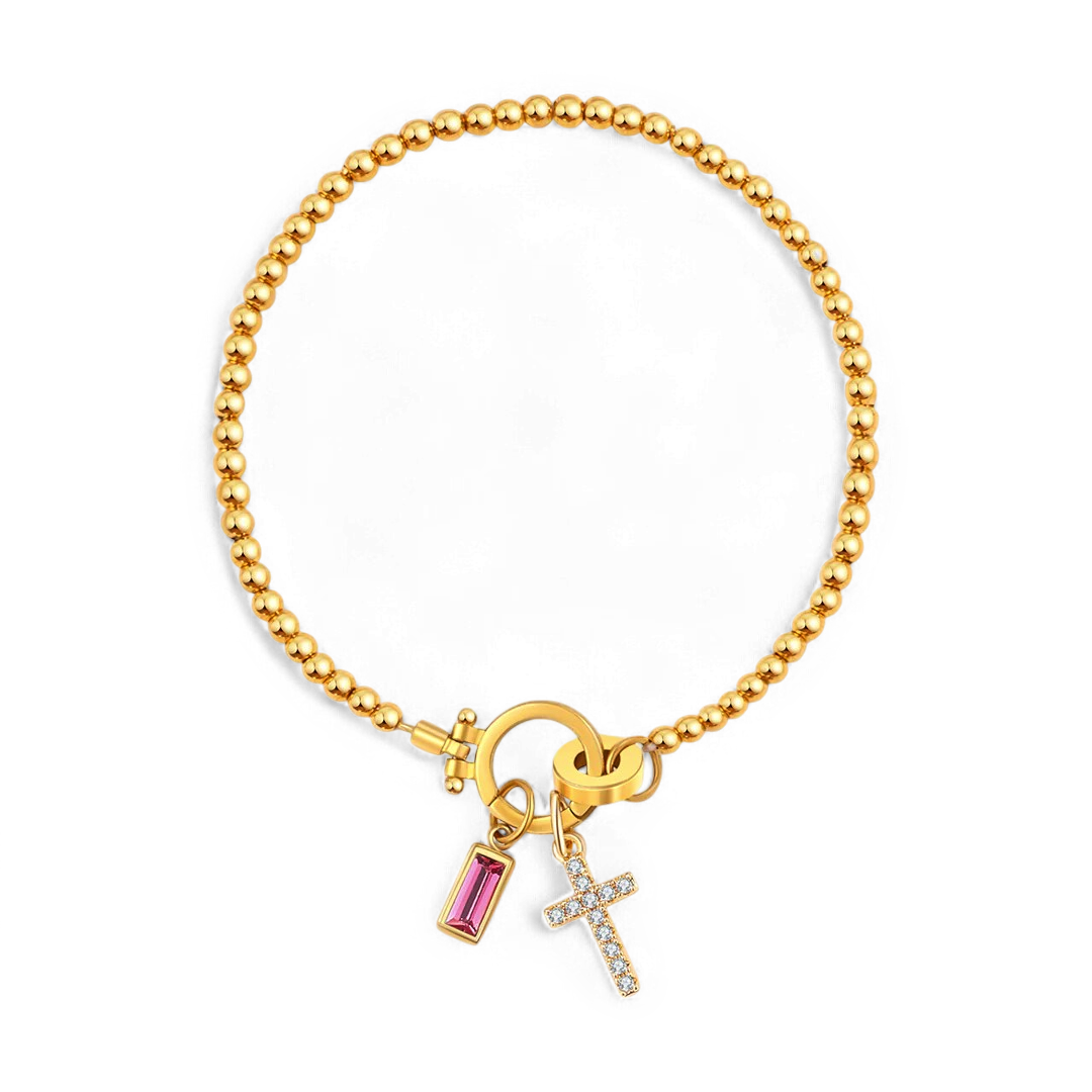 Cross Charm Birthstone Bracelet in gold tone with October birthstone