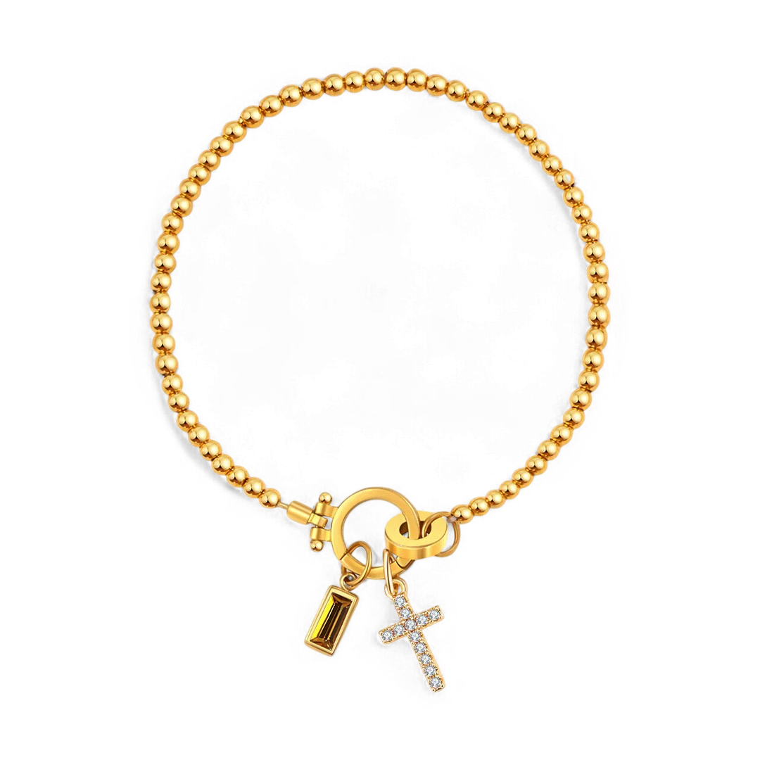 Cross Charm Birthstone Bracelet in gold tone with November birthstone