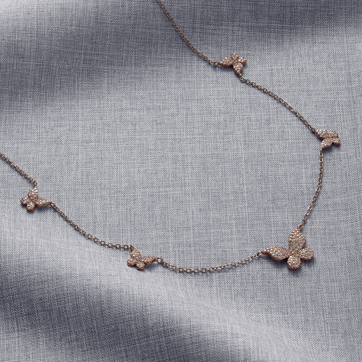 Five Butterfly Necklace in rose gold tone