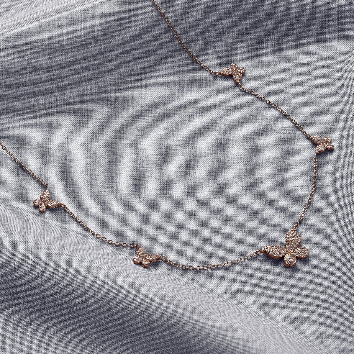 Five Butterfly Necklace in rose gold tone