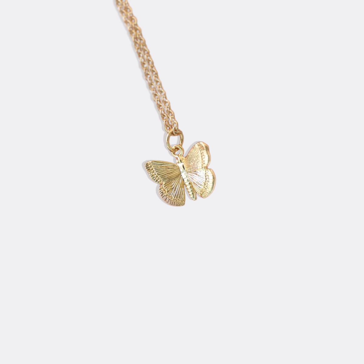 Collana con ciondolo a farfalla