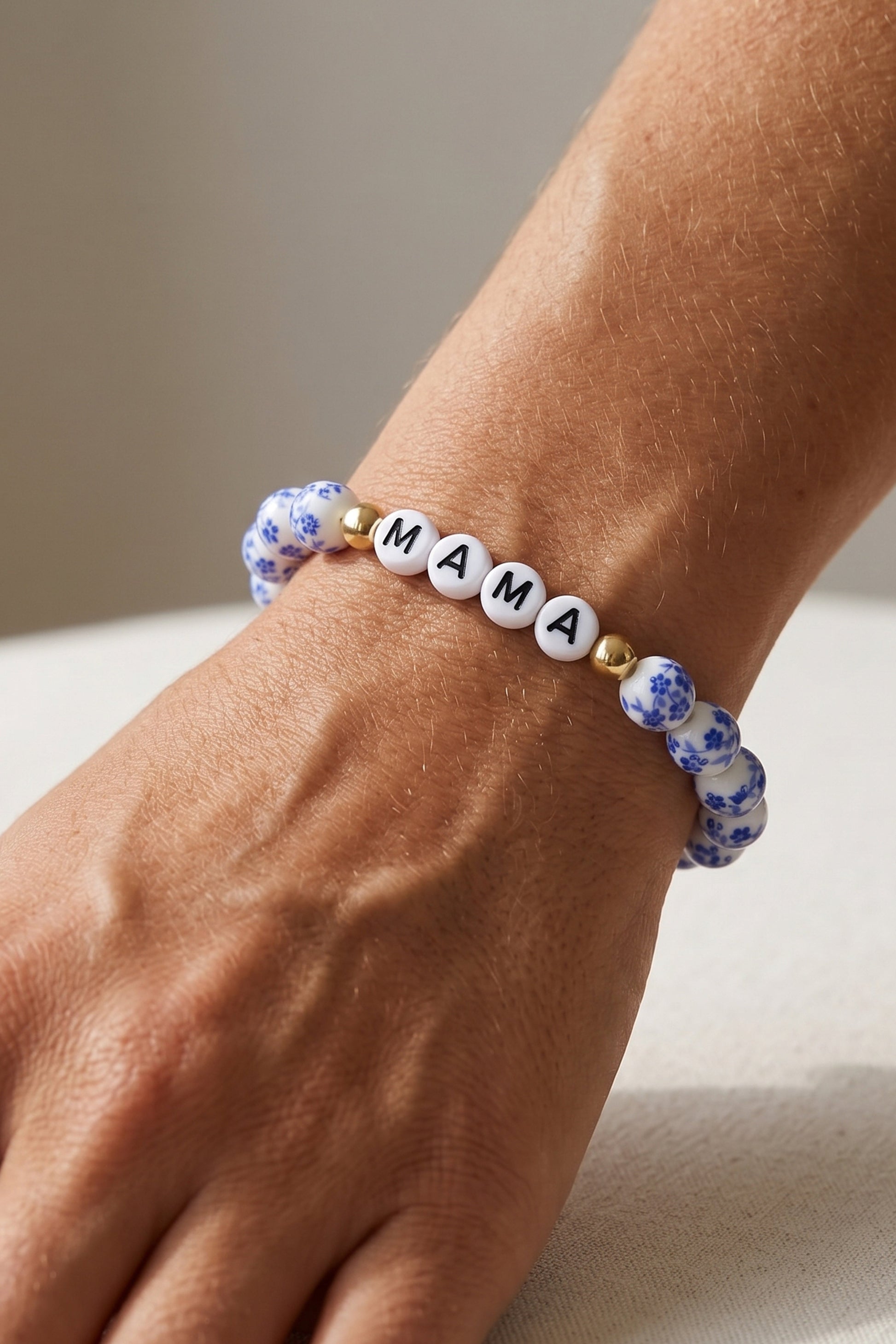 Blue Porcelain Floral Beaded Bracelet for Mom & Grandma, worn on a model