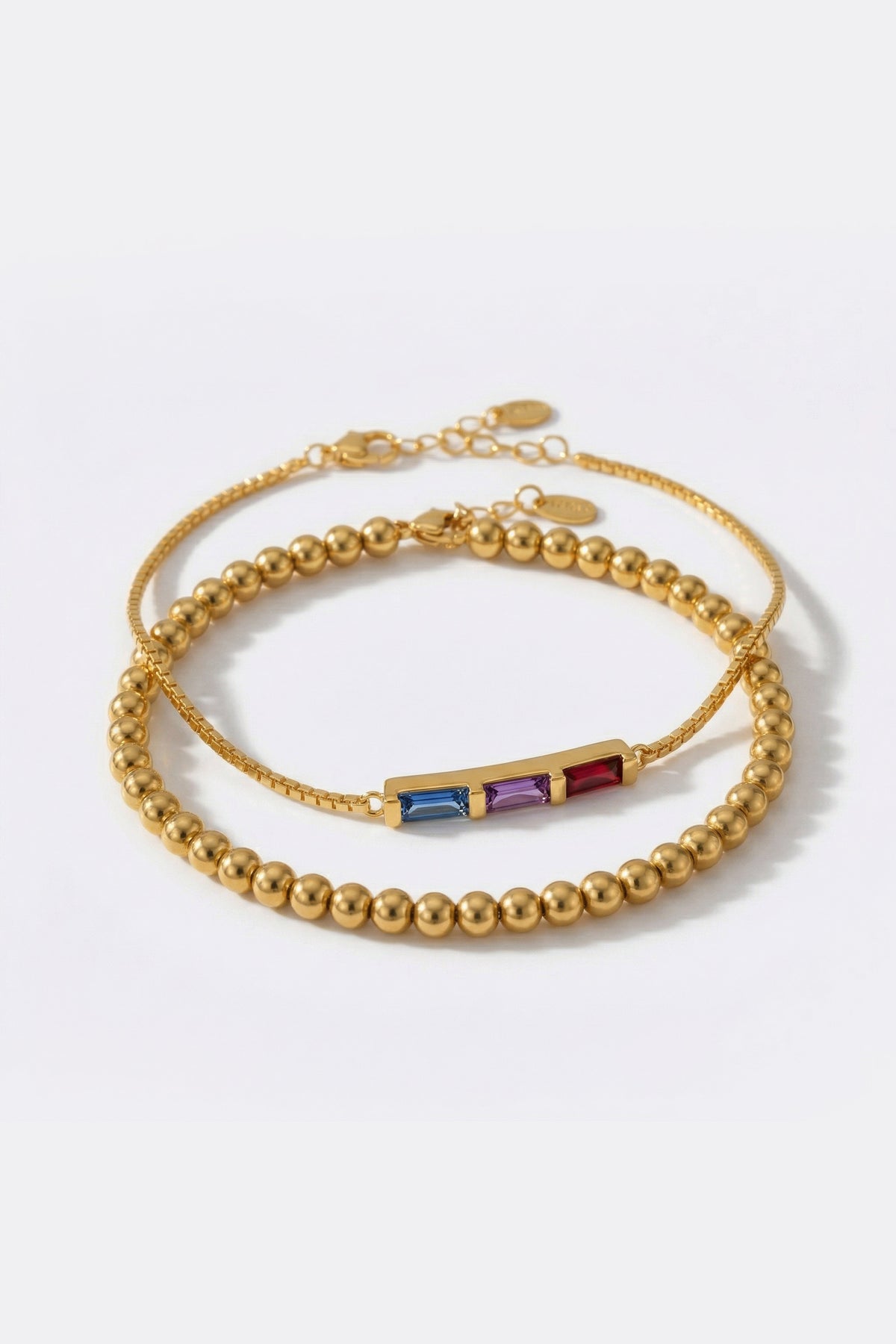 Dainty Baguette Birthstone Bracelet and Beaded Stacking Bracelet Set, flat lay detail