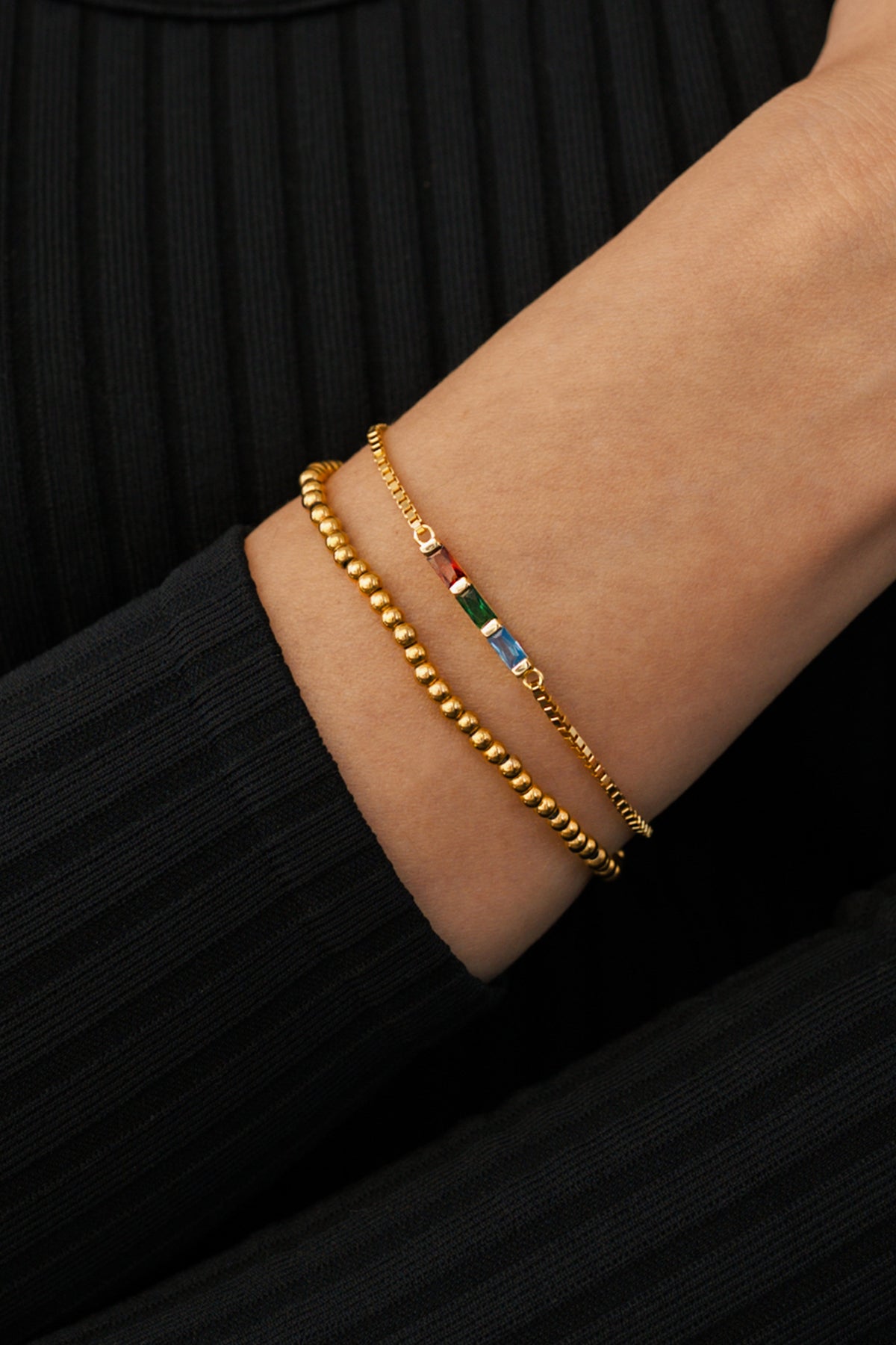 Dainty Baguette Birthstone Bracelet and Beaded Stacking Bracelet Set, worn on a model