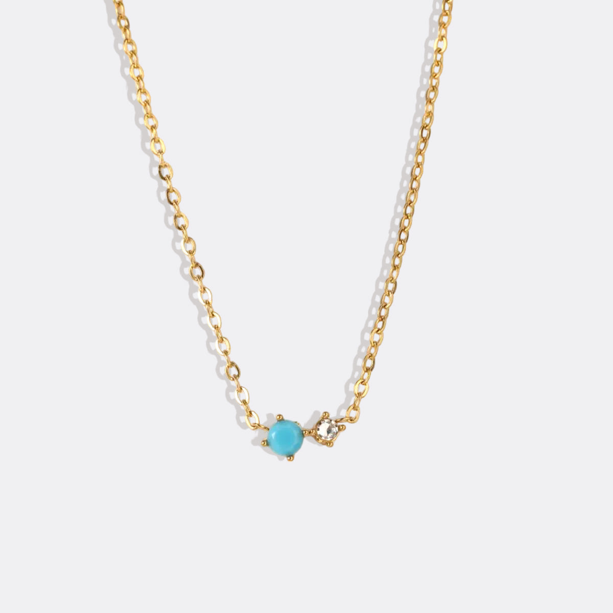 Dainty Birthstone Solitaire Necklace with Diamond Accent in gold tone with December birthstone