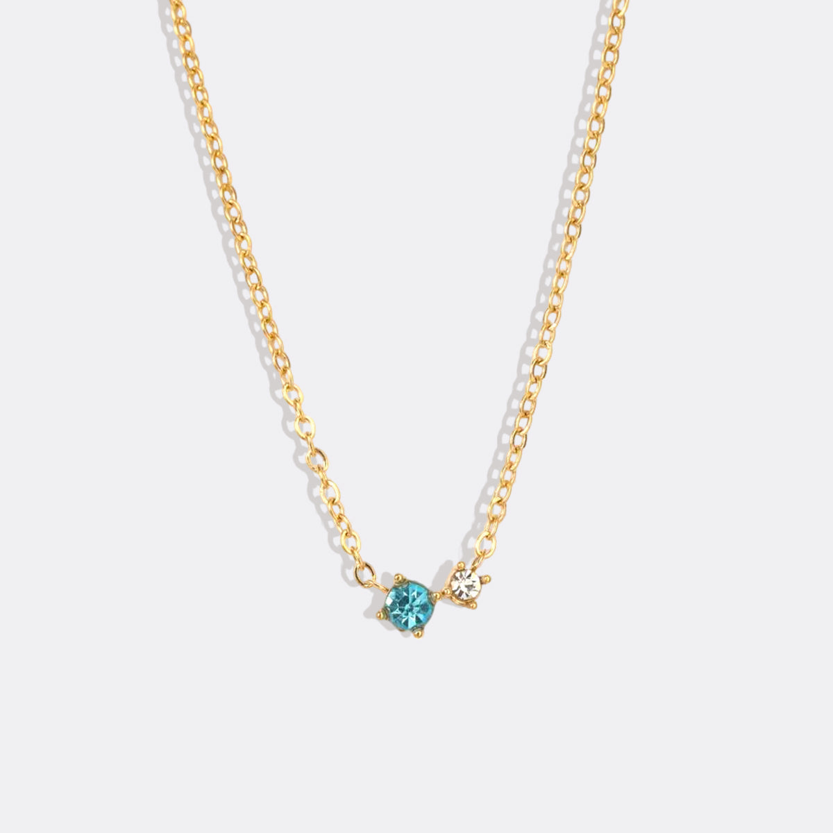 Dainty Birthstone Solitaire Necklace with Diamond Accent in gold tone with March birthstone