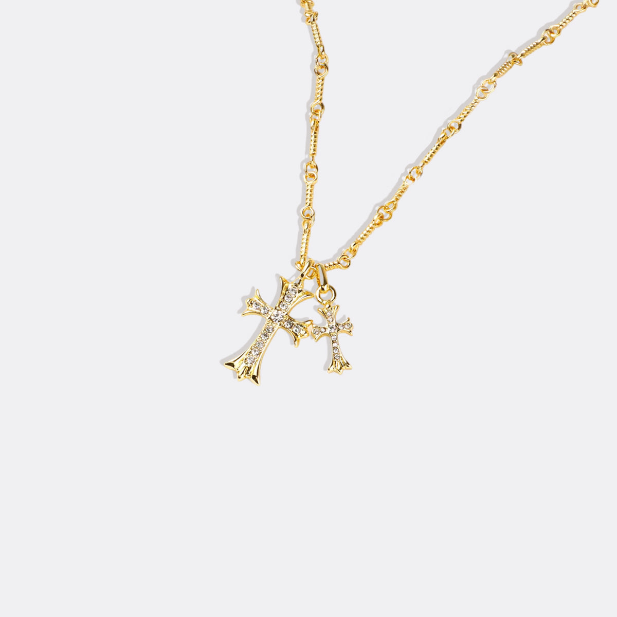 Double Cross Pendant Necklace in gold tone