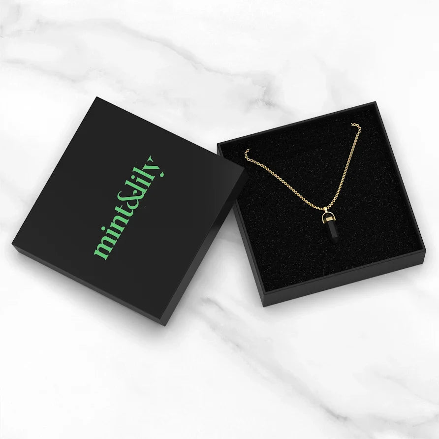 Gemstone Point Necklace in gold tone, in its gift packaging