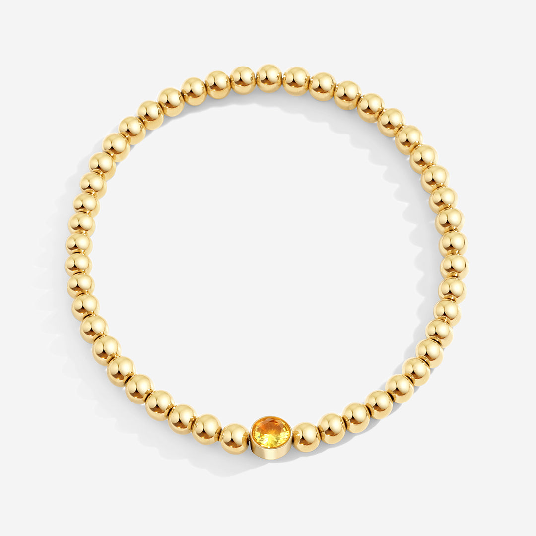 Vergoldetes Perlenarmband mit Geburtsstein