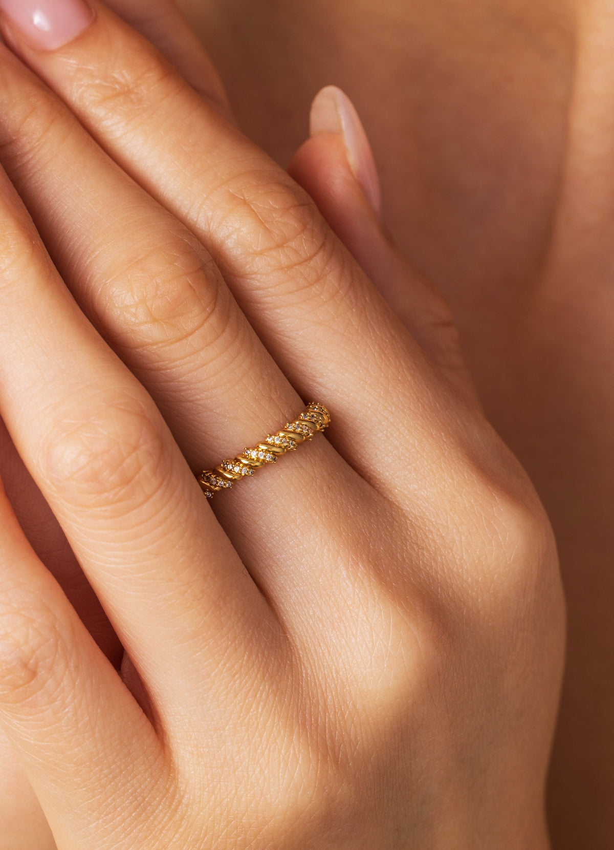 Golden Helix Ring, worn on a model