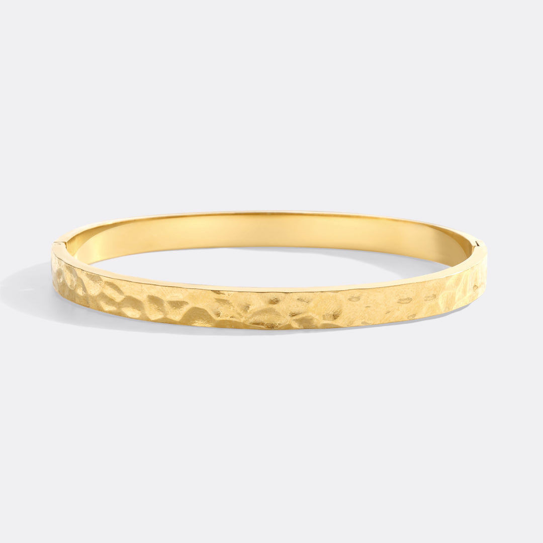 Gehämmerte Goldmanschette