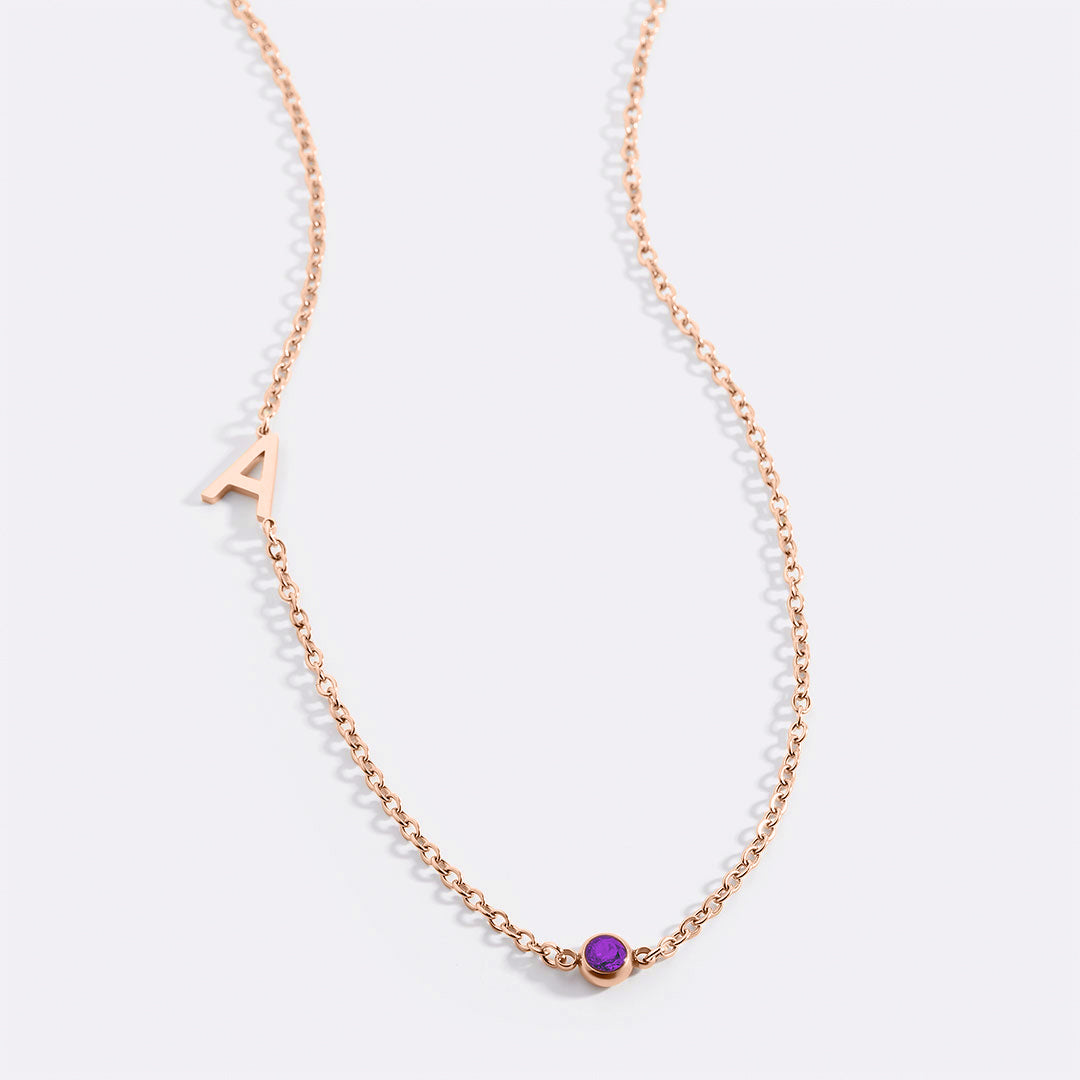 Initial Necklace with Birthstone Accent in rose gold tone with February birthstone