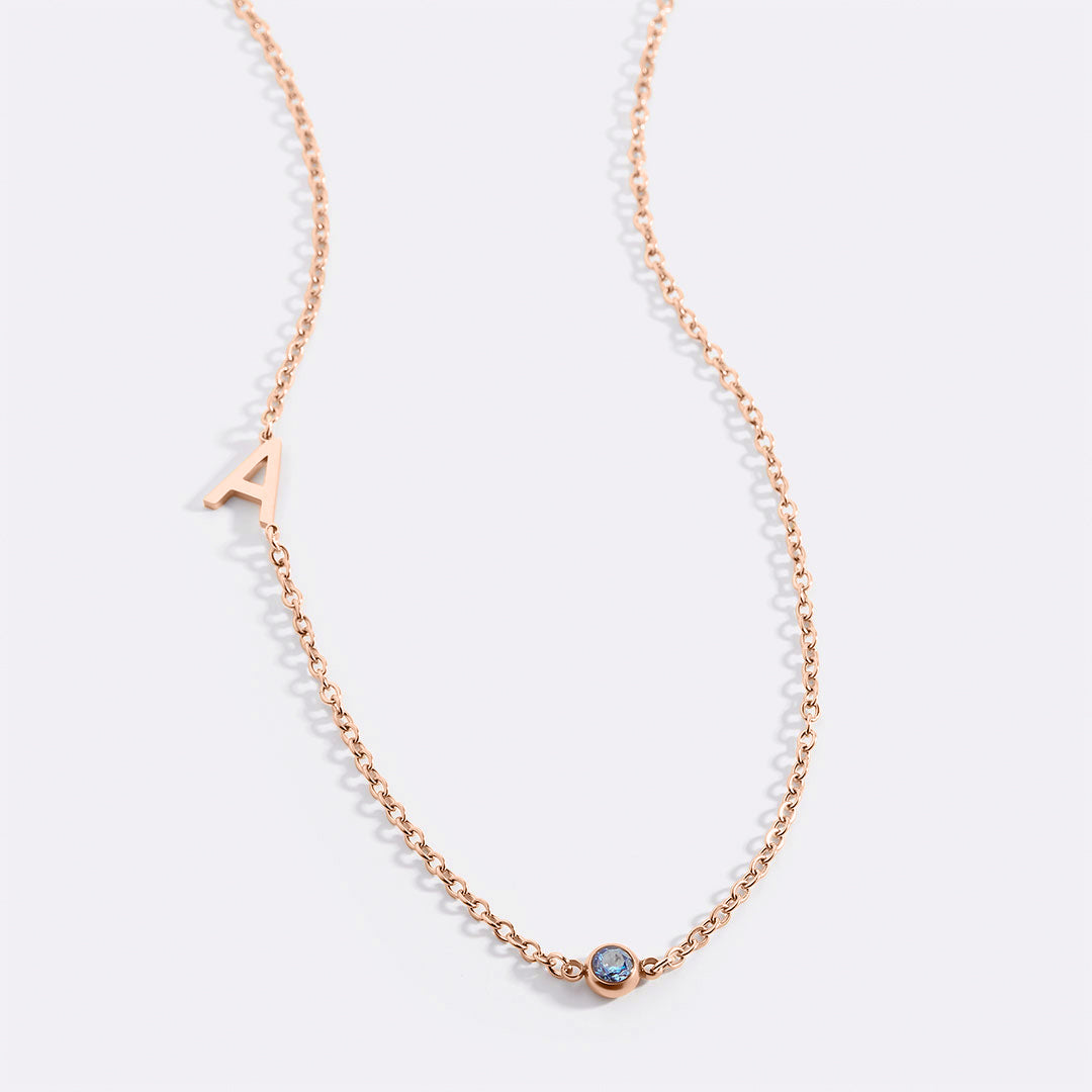Initial Necklace with Birthstone Accent in rose gold tone with March birthstone