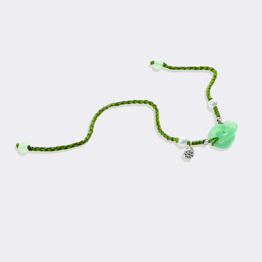 Armband mit Jadeperlen und Lotusblüte für Wohlstand