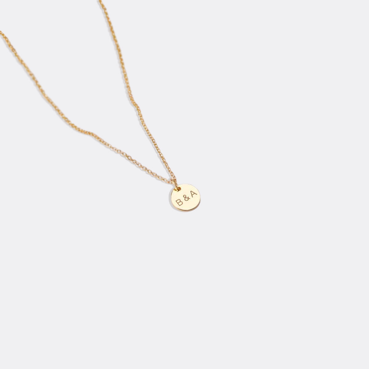 Love Disc Initial Necklace in gold tone