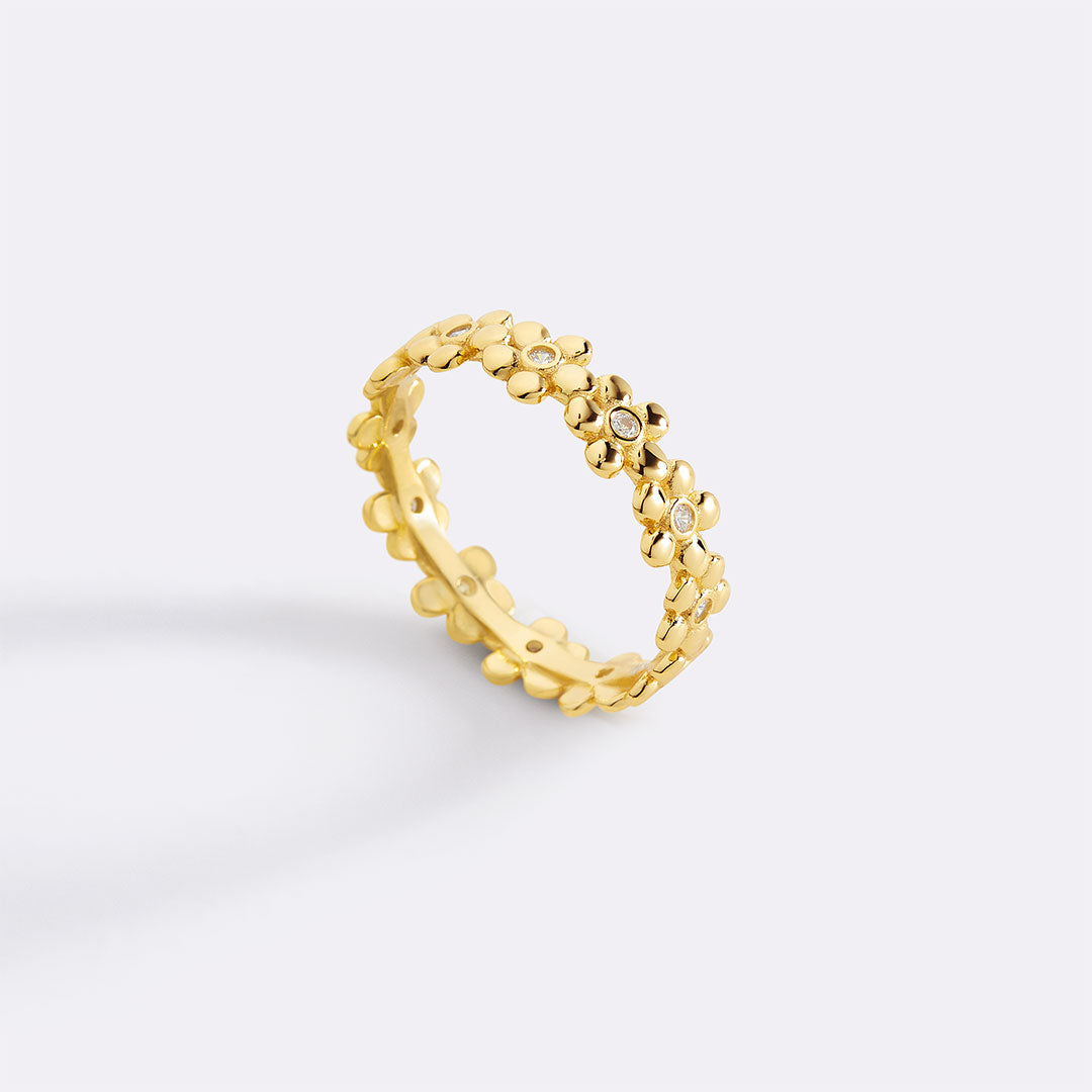 Eternity-Ring mit Diamanten und Gänseblümchen