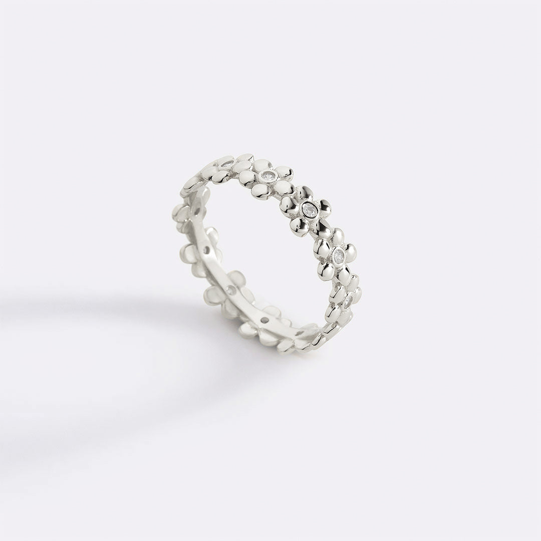 Eternity-Ring mit Diamanten und Gänseblümchen