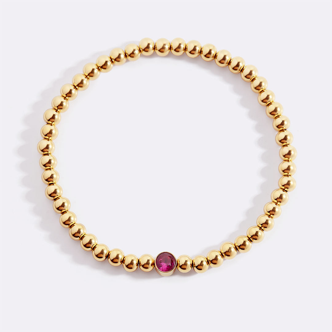 Gold Beaded Bubble Birthstone Bracelet in gold tone with July birthstone