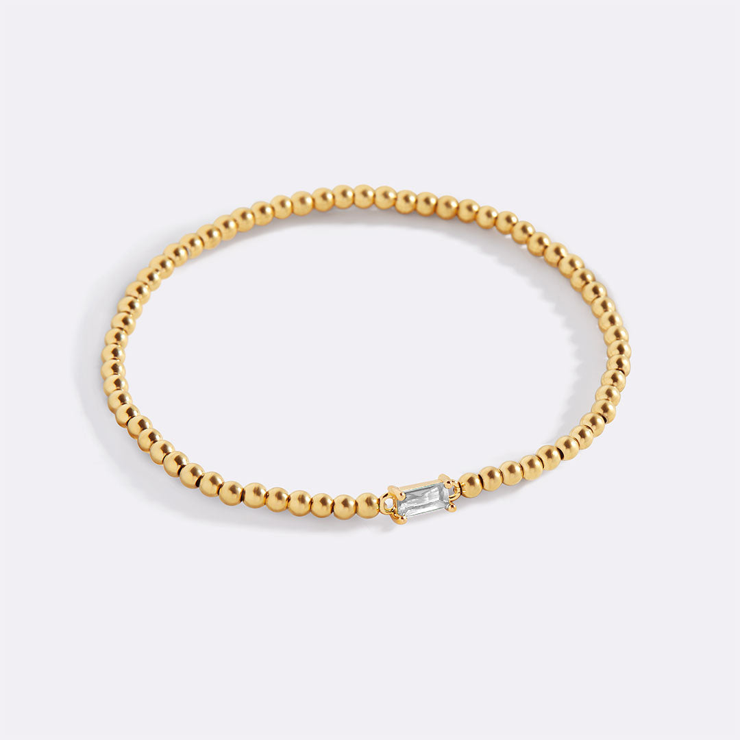 Gold Beaded Birthstone Bracelet in gold tone with April birthstone