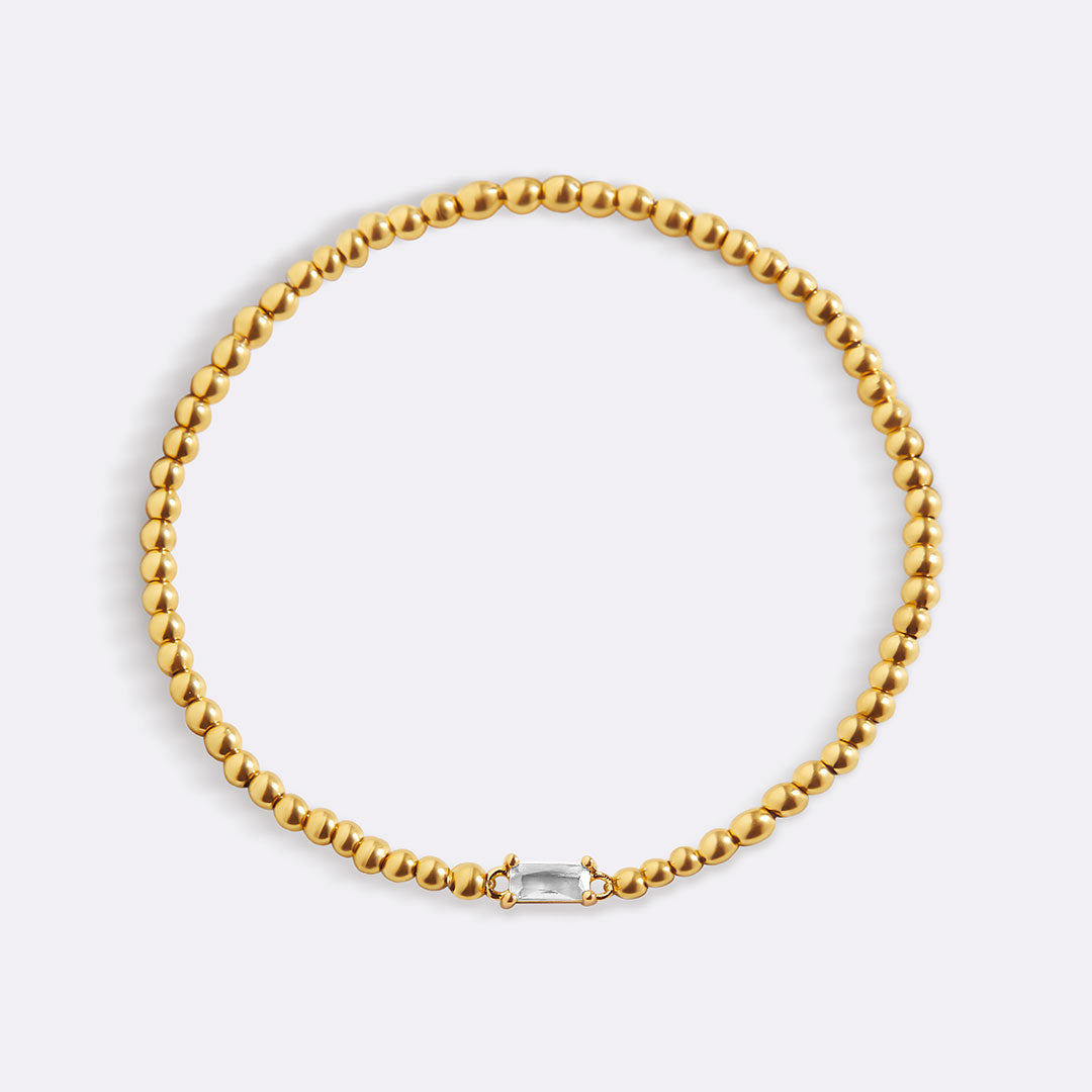 Gold Beaded Birthstone Bracelet in gold tone with April birthstone