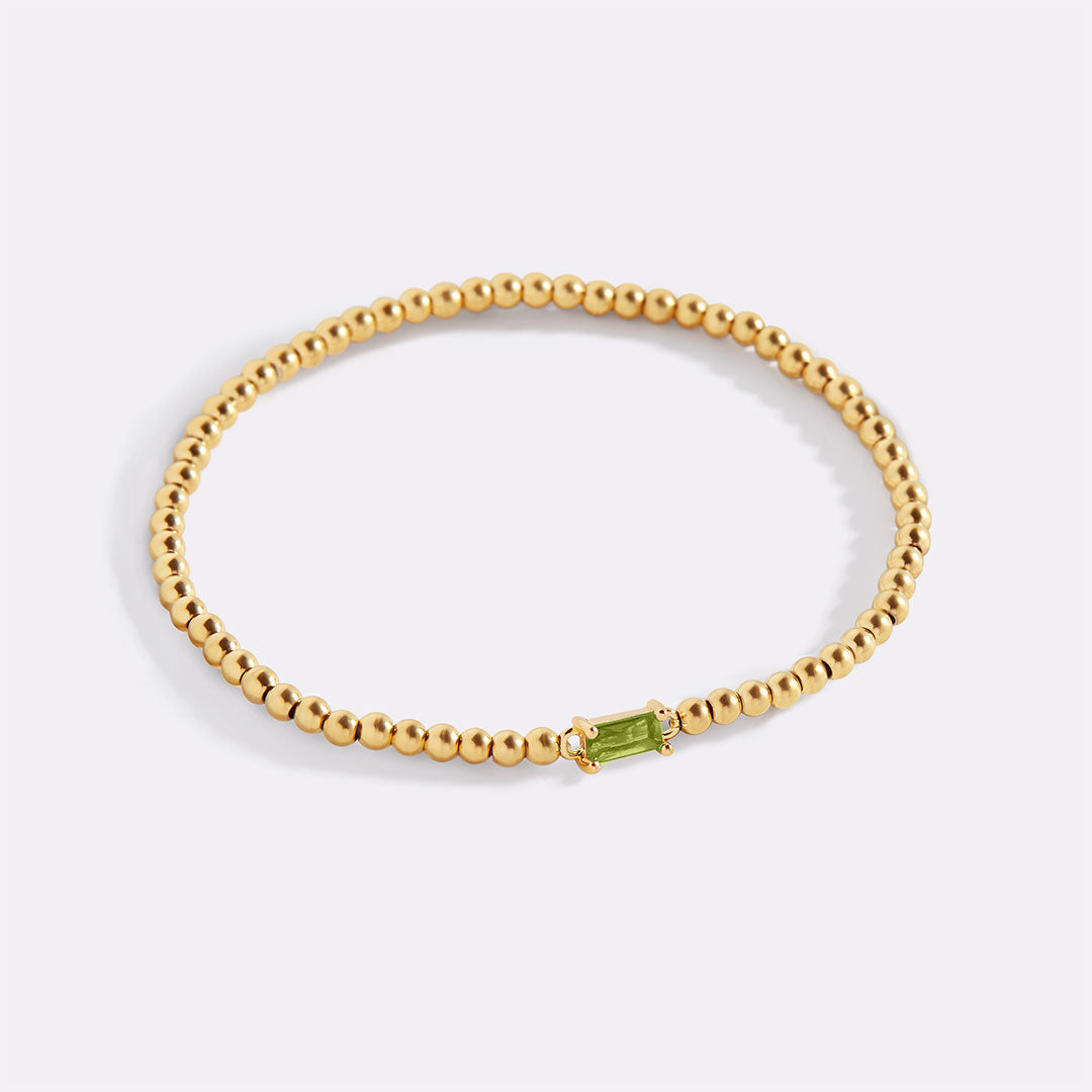 Gold Beaded Birthstone Bracelet in gold tone with August birthstone
