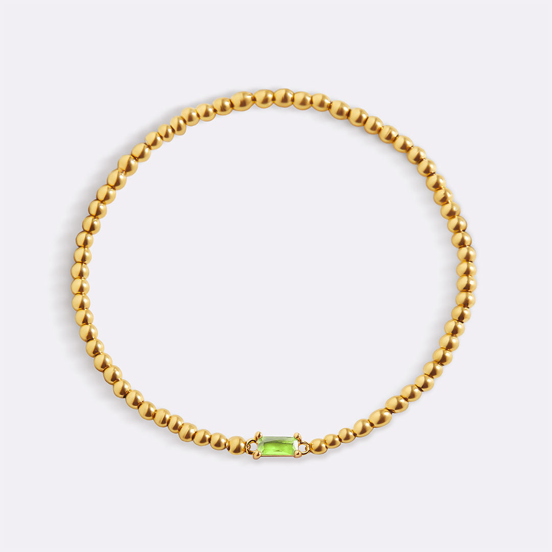 Gold Beaded Birthstone Bracelet in gold tone with August birthstone