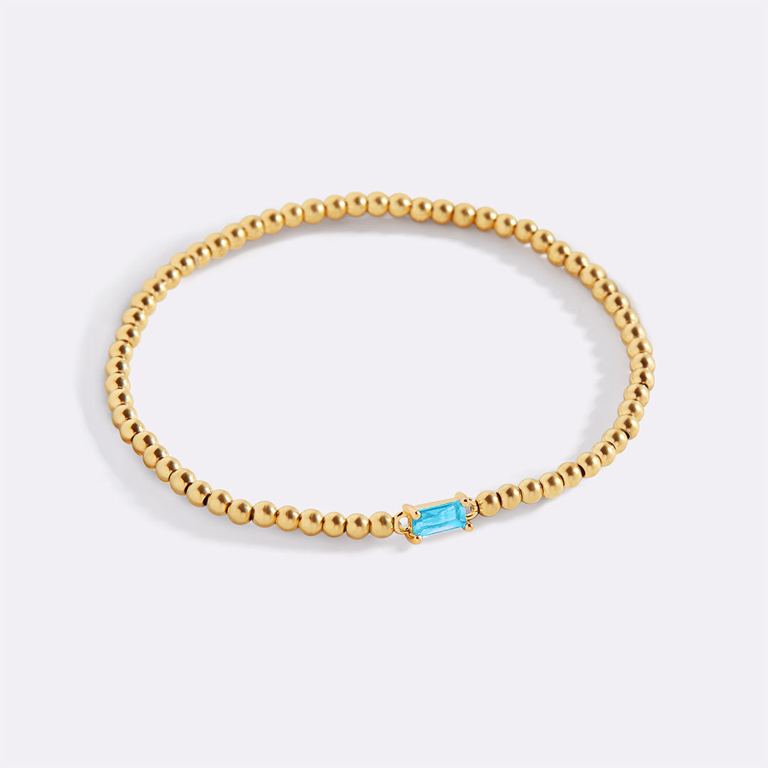 Gold Beaded Birthstone Bracelet in gold tone with March birthstone
